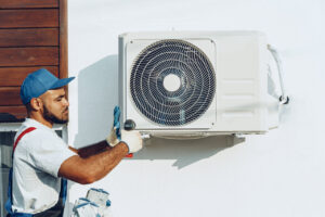 rsz repairman in uniform installing the outside unit o 2023 11 27 05 35 41 utc